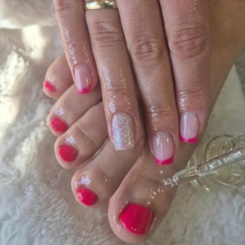 Pink French tips with one glitter nail, and a matching pink gel pedicure